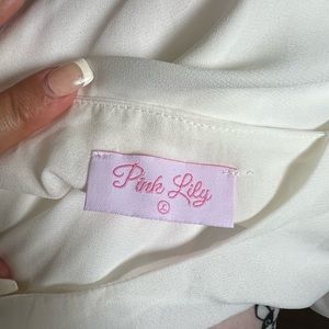 Pink, white and black loose, fit pink lily top